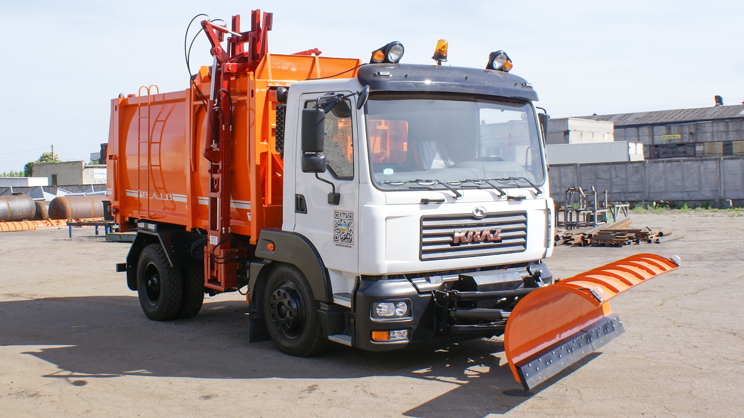 мусоровоз с боковой загрузкой ВЛИВ модели МИНИ Б на базе автомобильного шасси КрАЗ